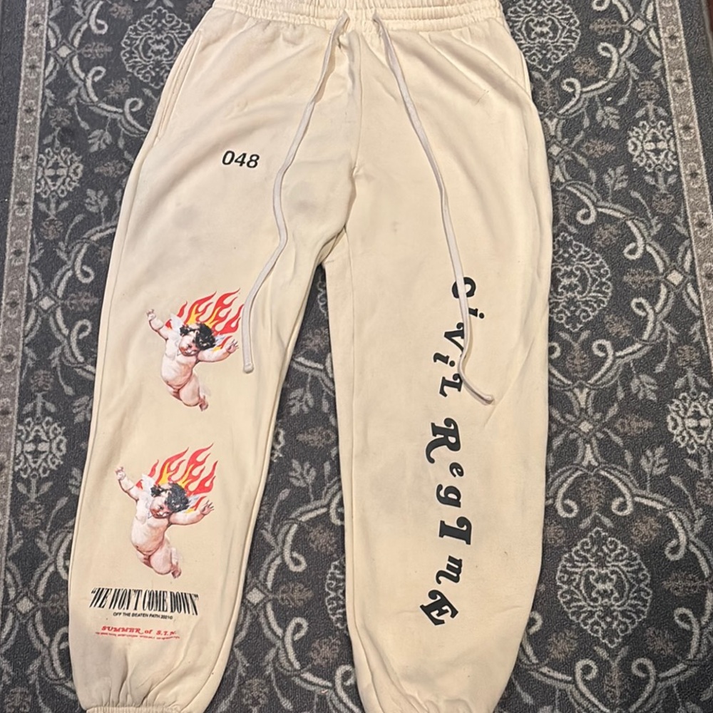 Casual Cream and Black Sweatpants with Graphic Design